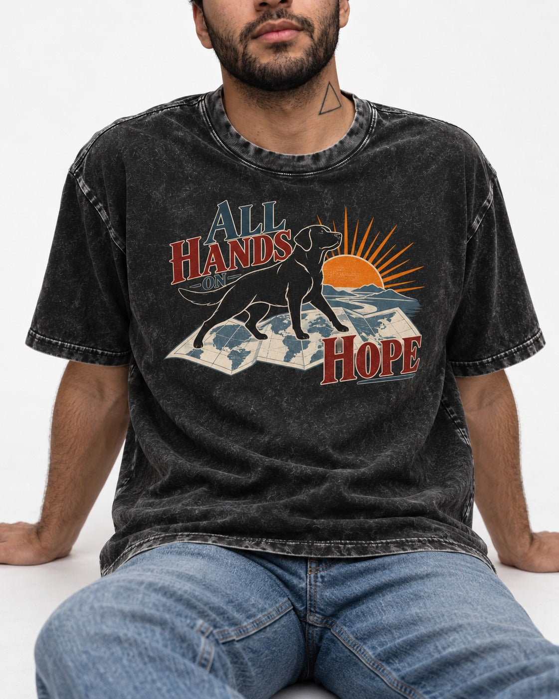Labrador Retriever All Hands on Hope Map Sunrise Graphic Washed Tee in Black, worn by a seated model