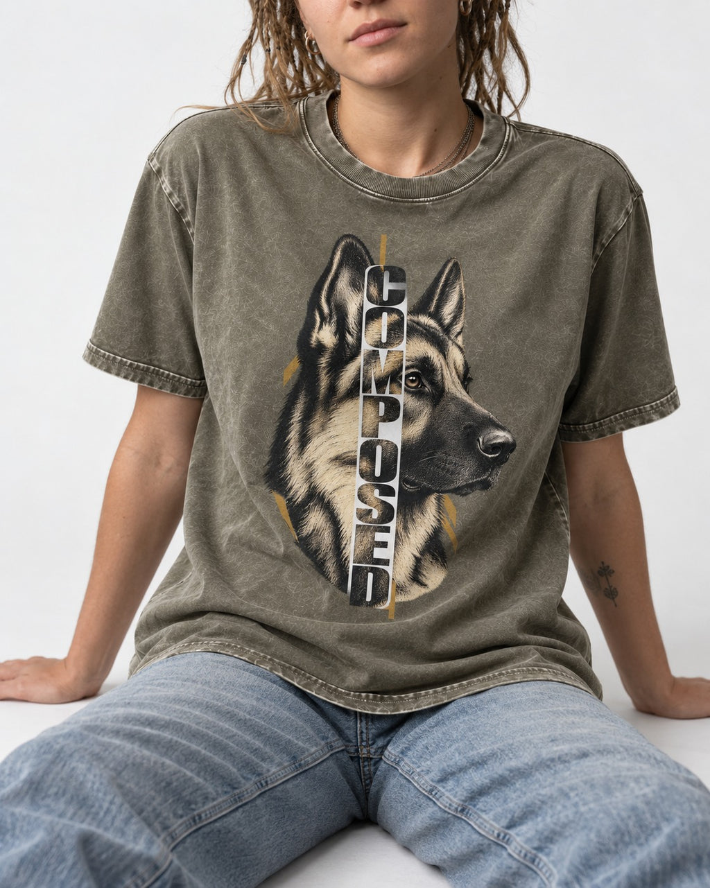 Composed Profile German Shepherd Dog Graphic Washed Tee in Army Green, worn by a seated model