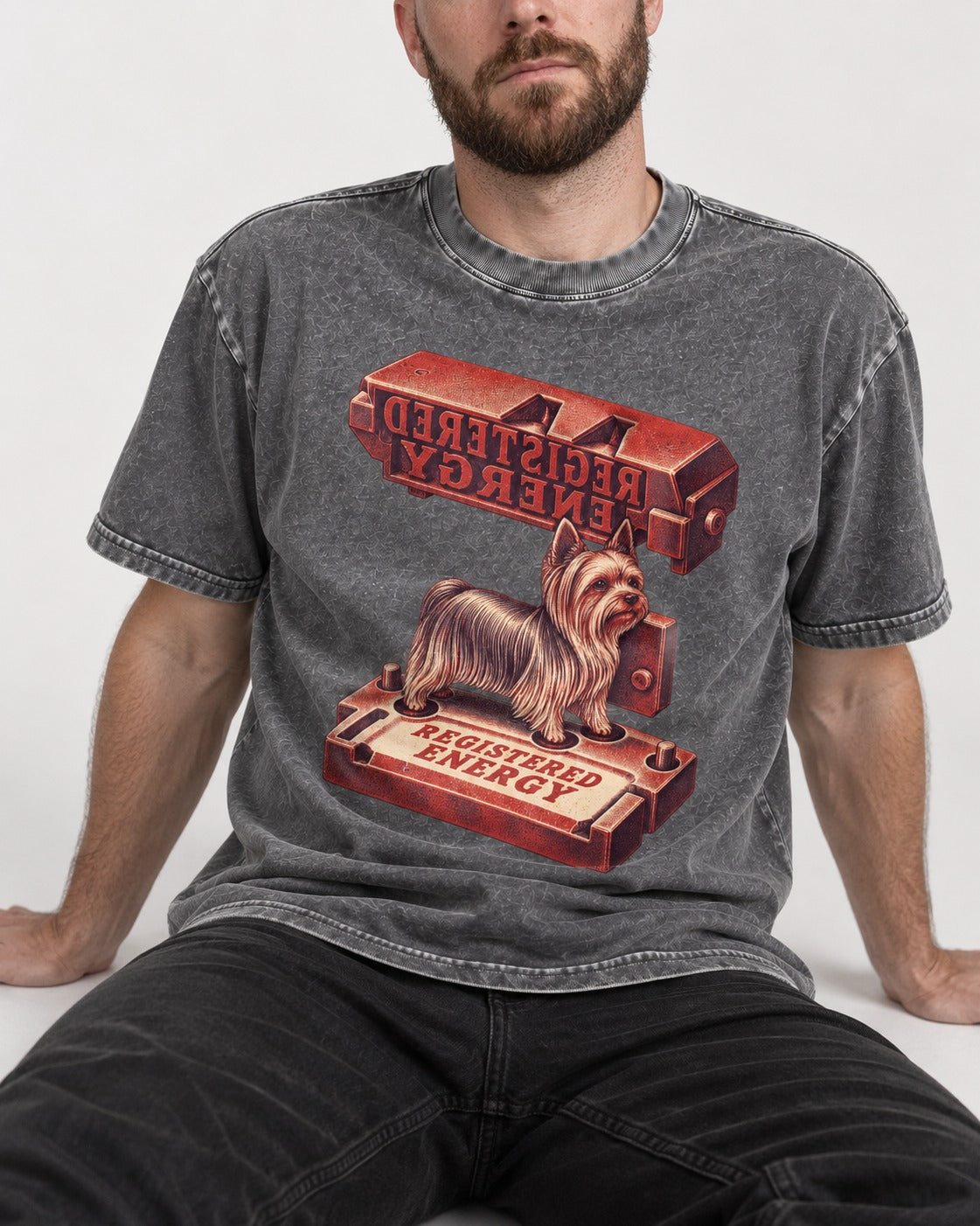 Yorkshire Terrier Registered Energy Stamp Press Graphic Washed Tee in Gray, worn by a seated model