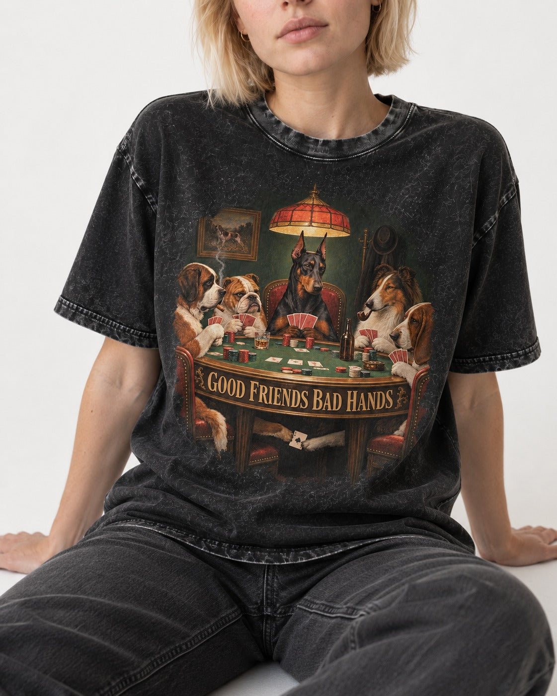 Doberman Good Friends Bad Hands Poker Night Graphic Washed Tee in Black, worn by a seated model