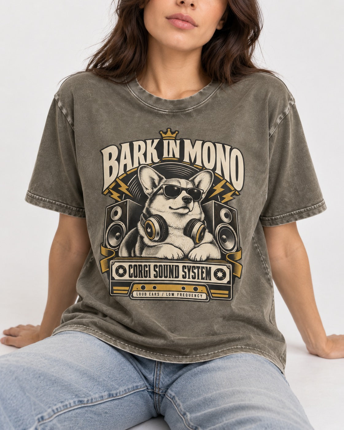 Corgi Bark in Mono Sound System Washed Tee in Army Green, worn by a seated model