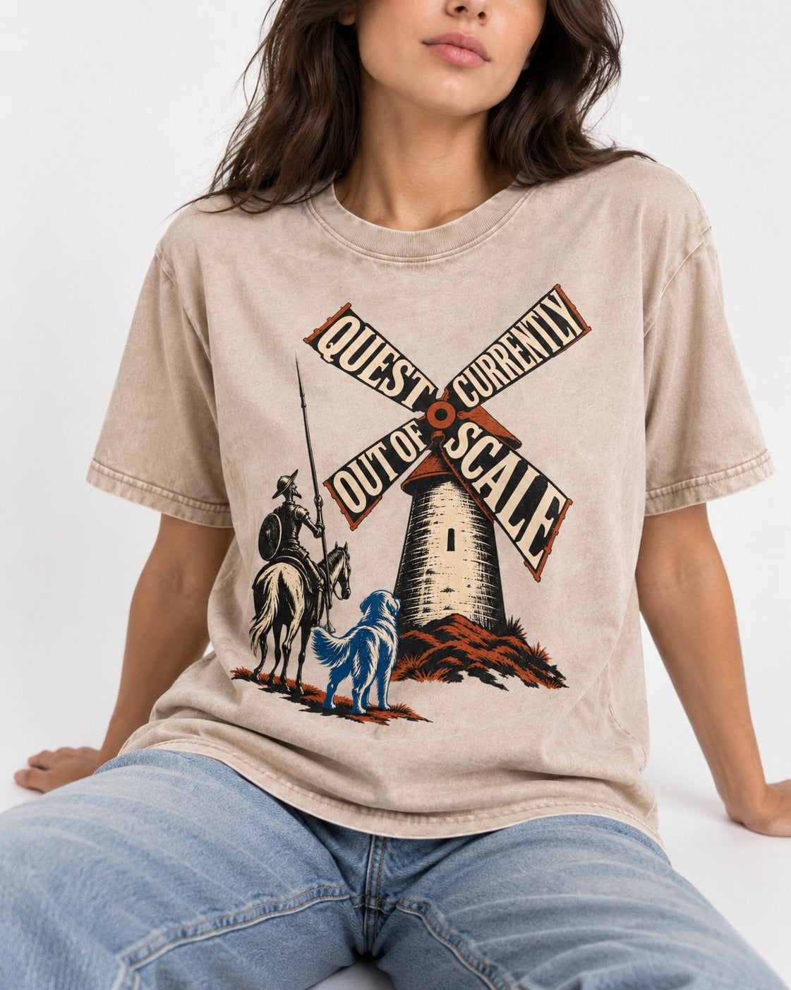 Golden Retriever Quest Out of Scale Washed Tee in Apricot, worn by a seated model