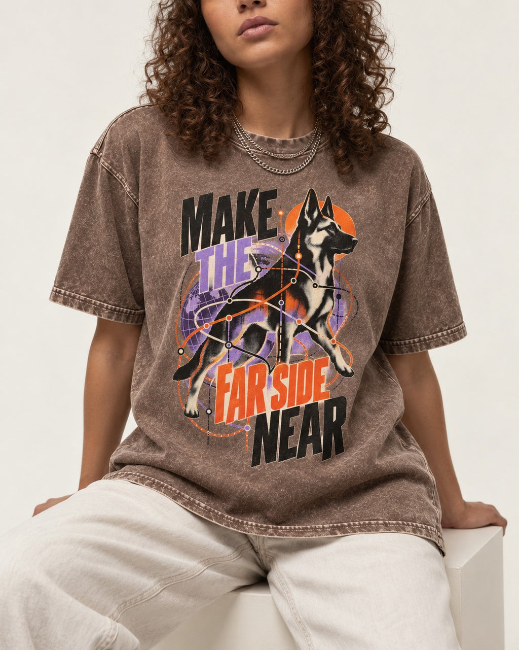 German Shepherd Dog Far Side Near Washed Tee in Coffee, worn by a seated model