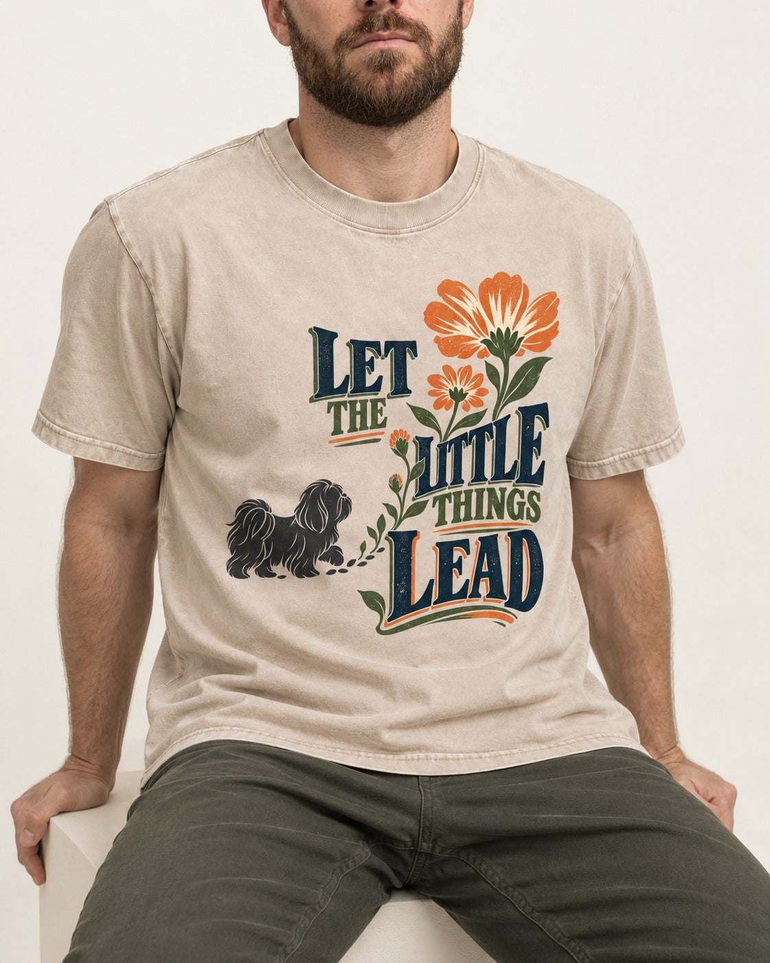 Let the Shih Tzu Lead Washed Tee in Apricot, worn by a seated model