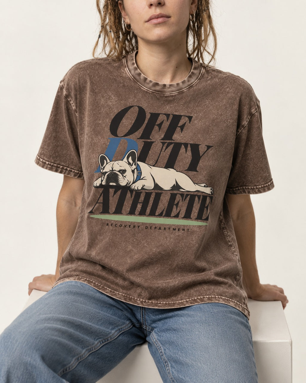 Off Duty Athlete Frenchie Washed Tee in Coffee, worn by a seated model