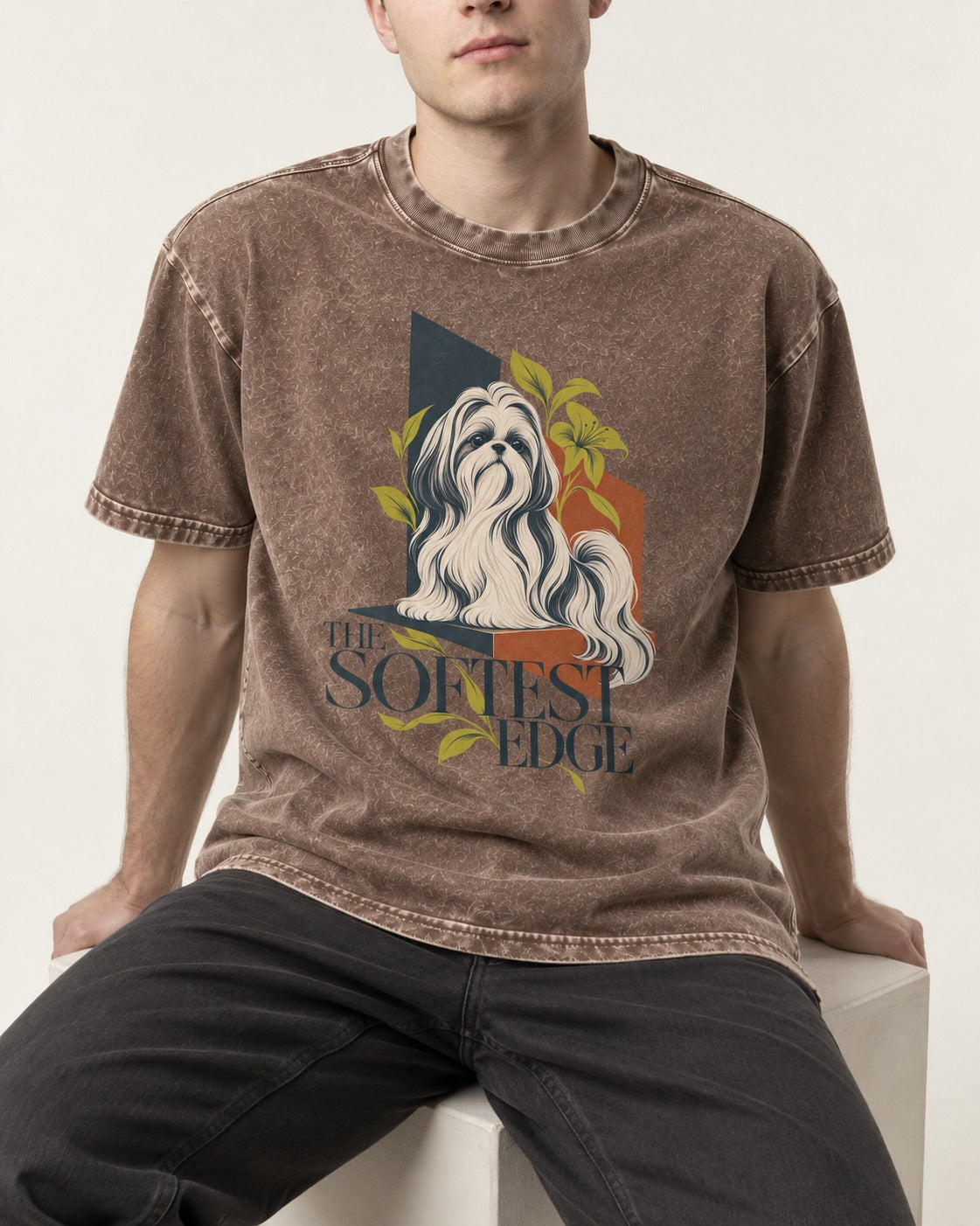 Shih Tzu The Softest Edge Washed Tee in Coffee, worn by a seated model