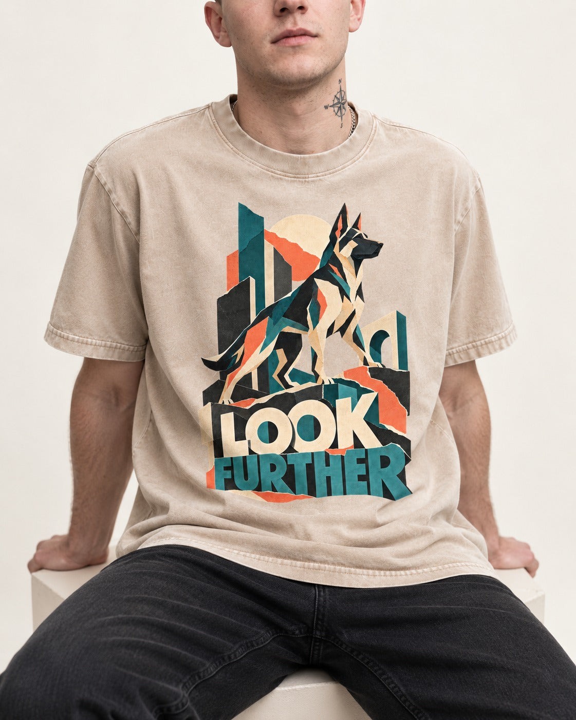 Look Further German Shepherd Dog Washed Tee in Apricot, worn by a seated model