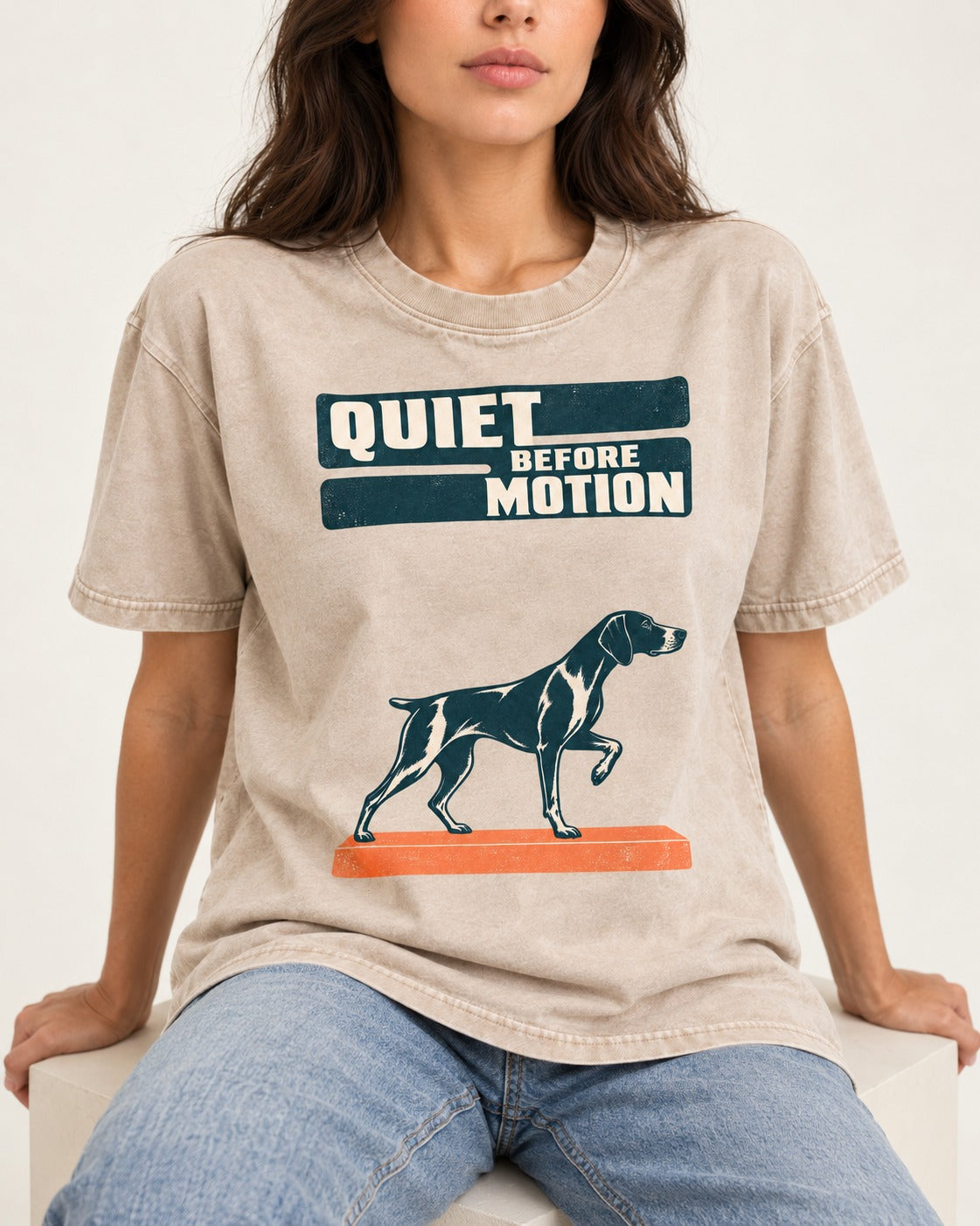 Quiet Before Motion German Shorthaired Pointer Washed Tee in Apricot, worn by a seated model