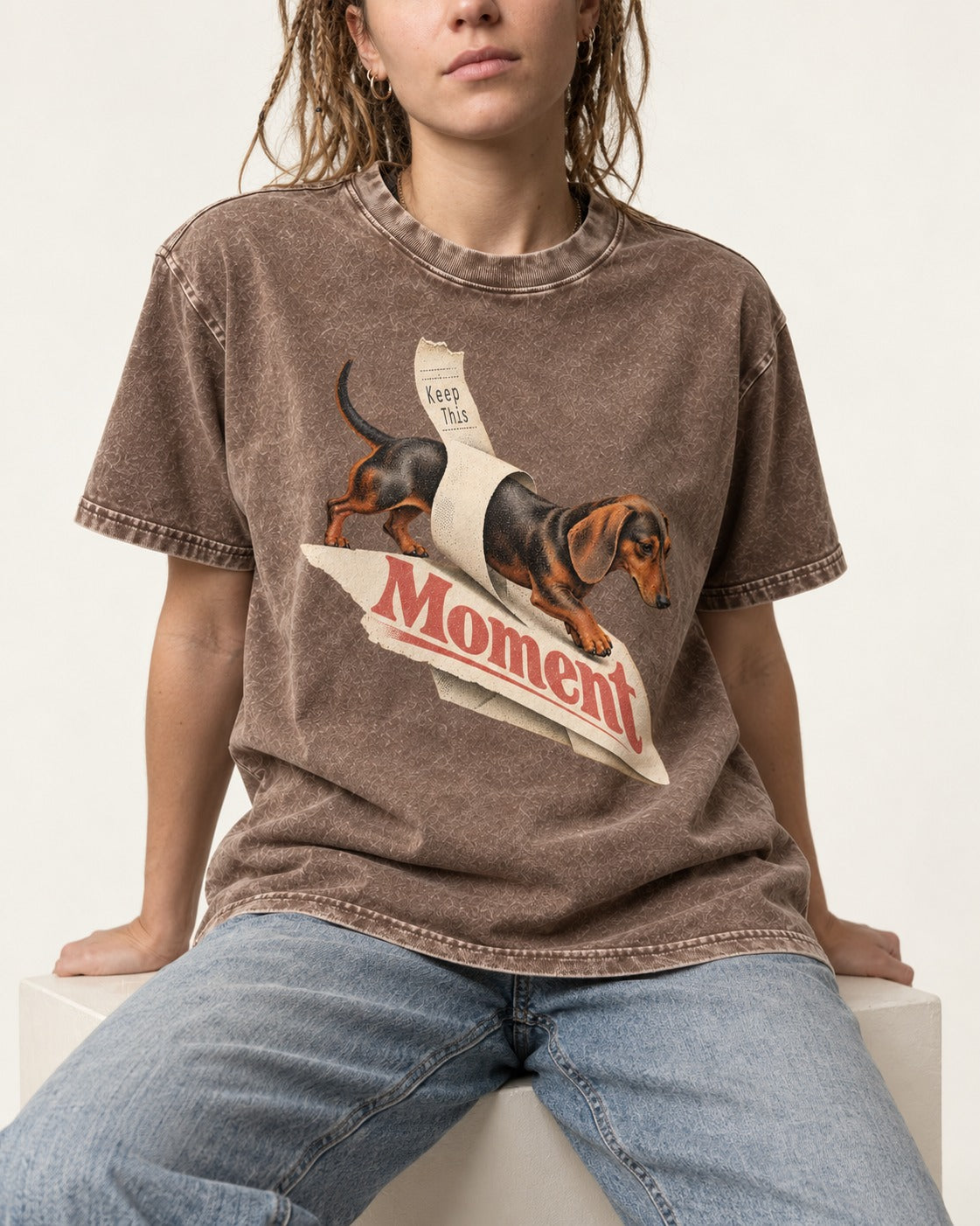 Dachshund Keep This Moment Receipt Graphic Washed Tee in Coffee, worn by a seated model
