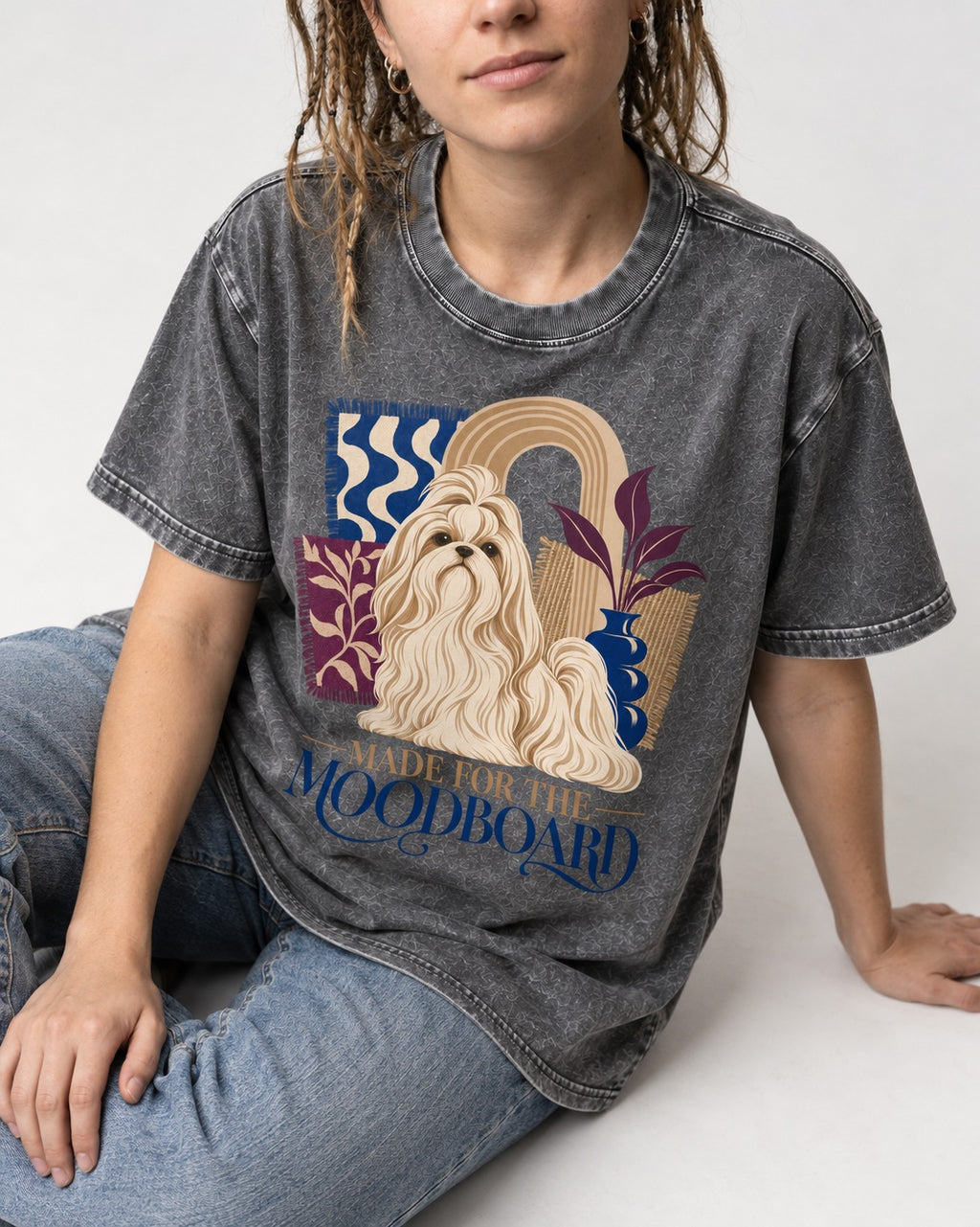 Shih Tzu Made for the Moodboard Boho Interior Graphic Washed Tee in Gray, worn by a seated model