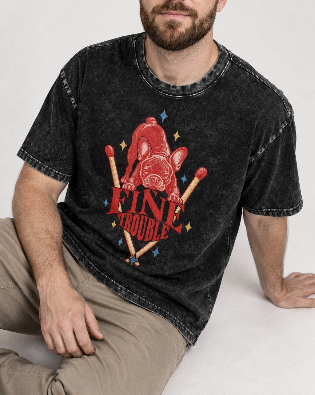 Fine Trouble Boston Terrier Matchstick Graphic Washed Tee in Black, worn by a seated model