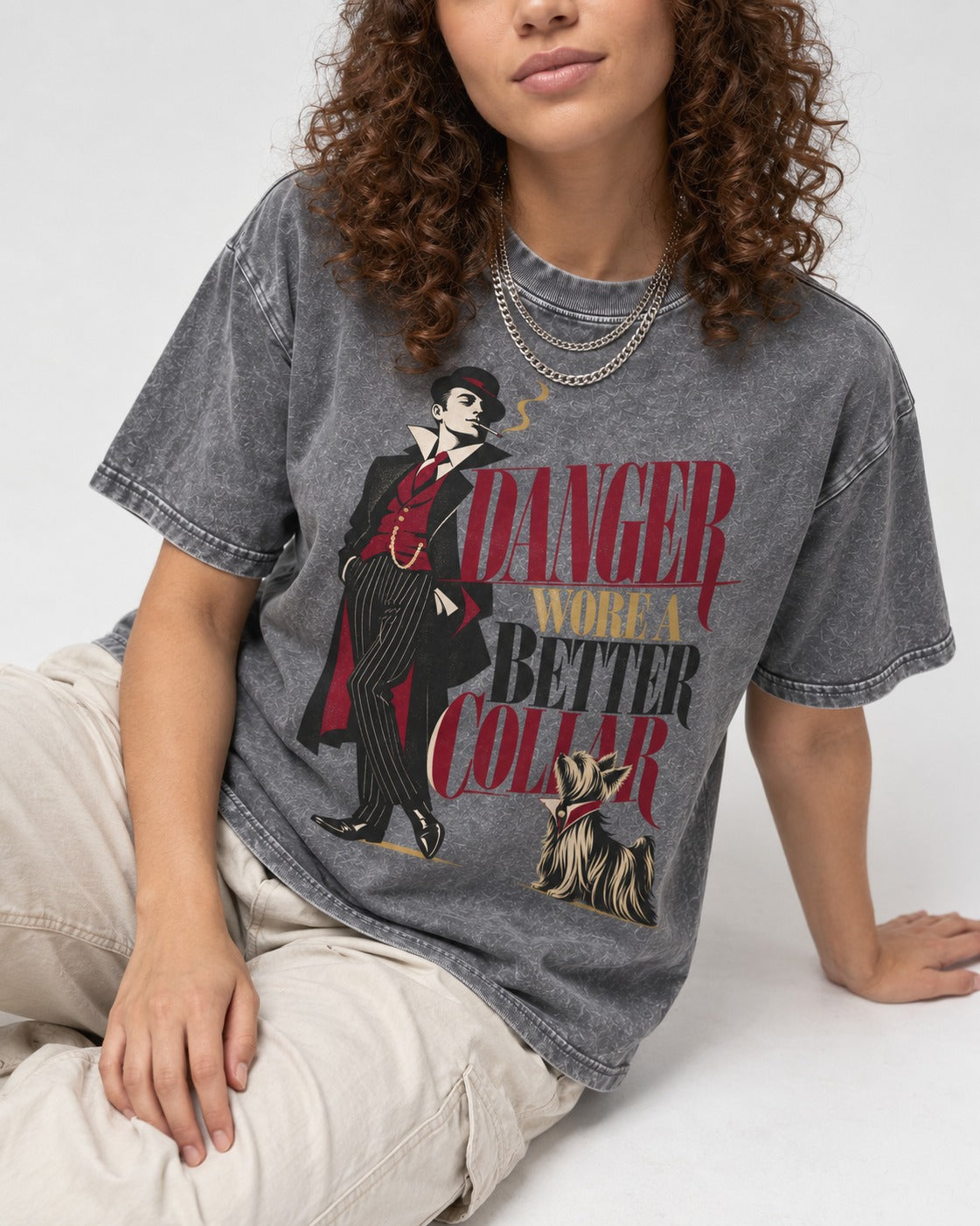 Yorkshire Terrier Danger Wore a Better Collar Art Deco Graphic Washed Tee in Gray, worn by a seated model