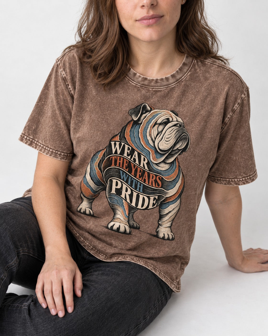 English Bulldog Wear the Years Washed Tee in Coffee, worn by a seated model