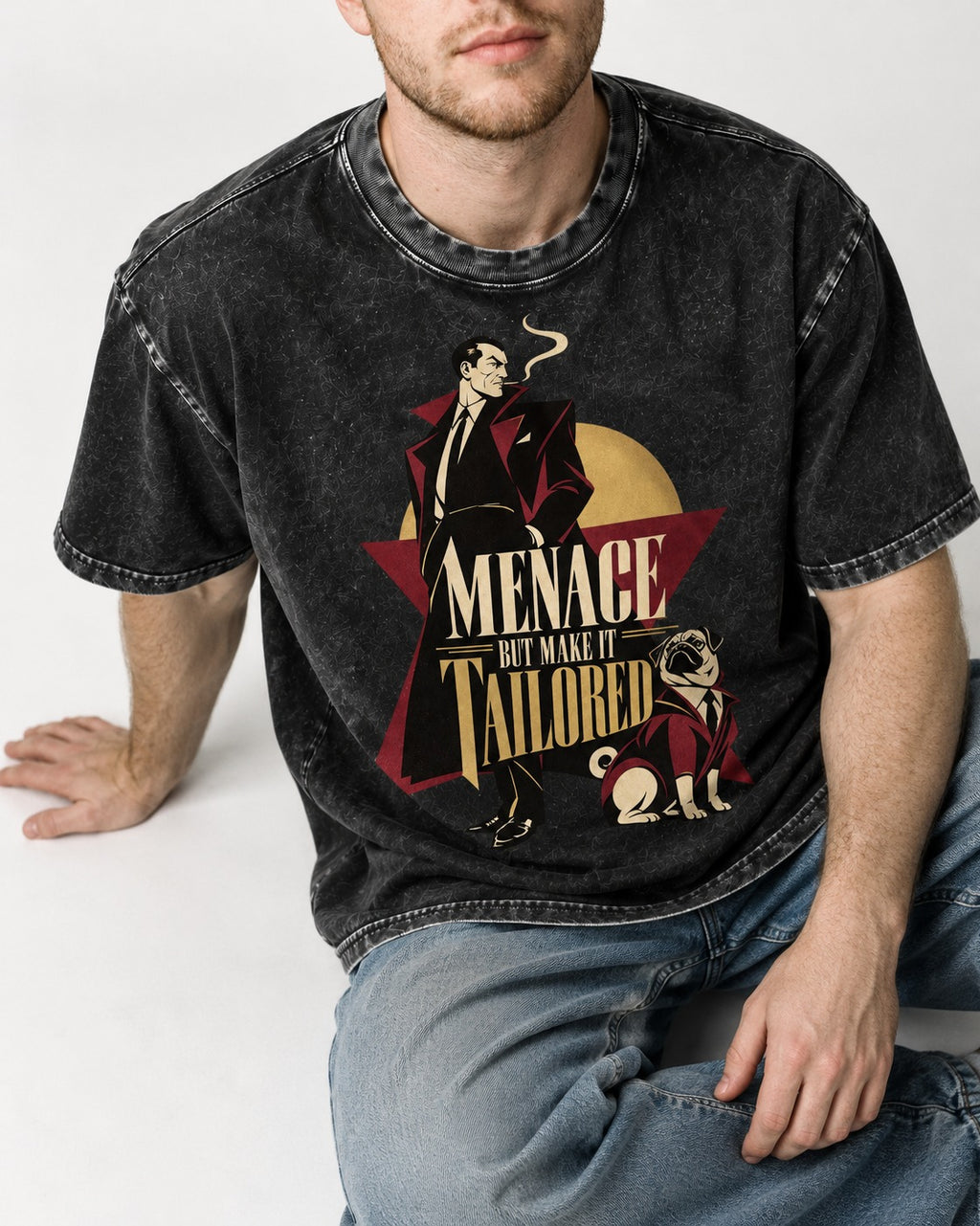 Pug Menace But Make It Tailored Graphic Washed Tee in Black, worn by a seated model