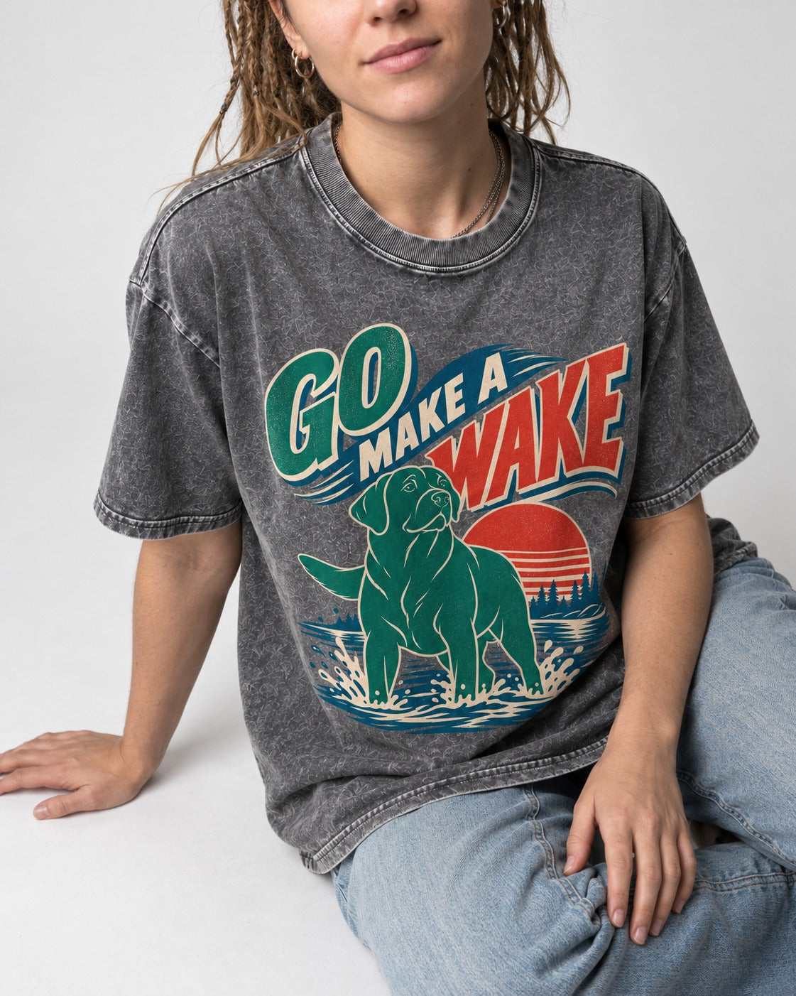 Labrador Retriever Go Make a Wake Lake Graphic Washed Tee in Gray, worn by a seated model