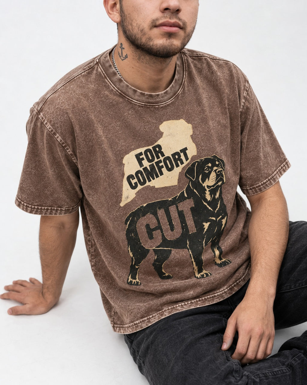 Rottweiler Cut for Comfort Washed Tee in Coffee, worn by a seated model