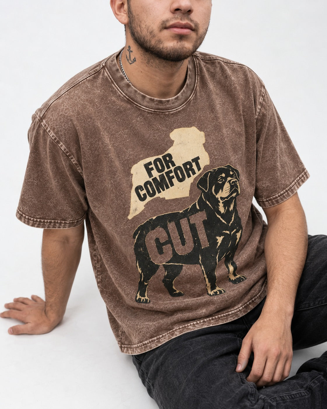 Rottweiler Cut for Comfort Washed Tee in Coffee, worn by a seated model