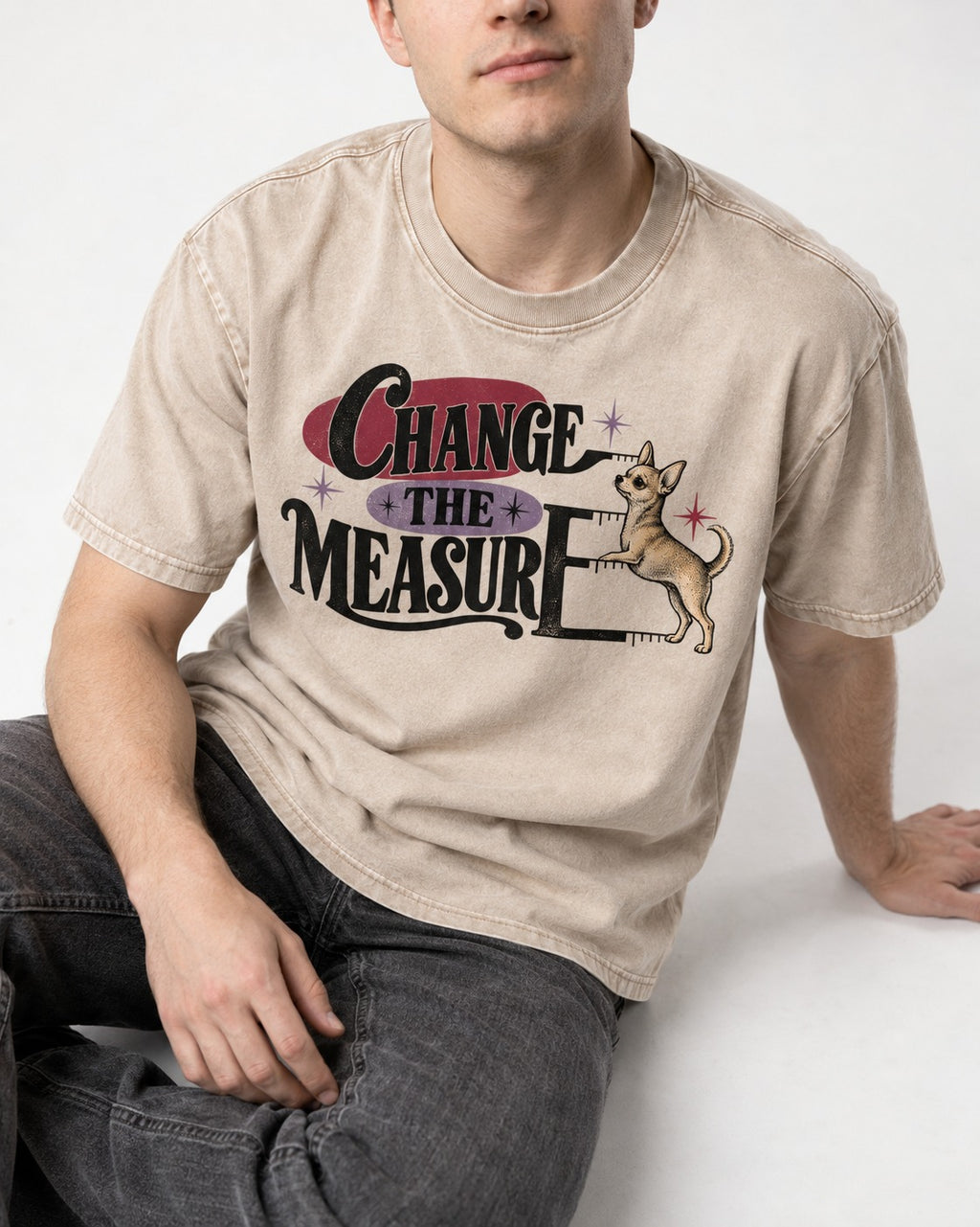 Change the Measure Chihuahua Washed Tee in Apricot, worn by a seated model