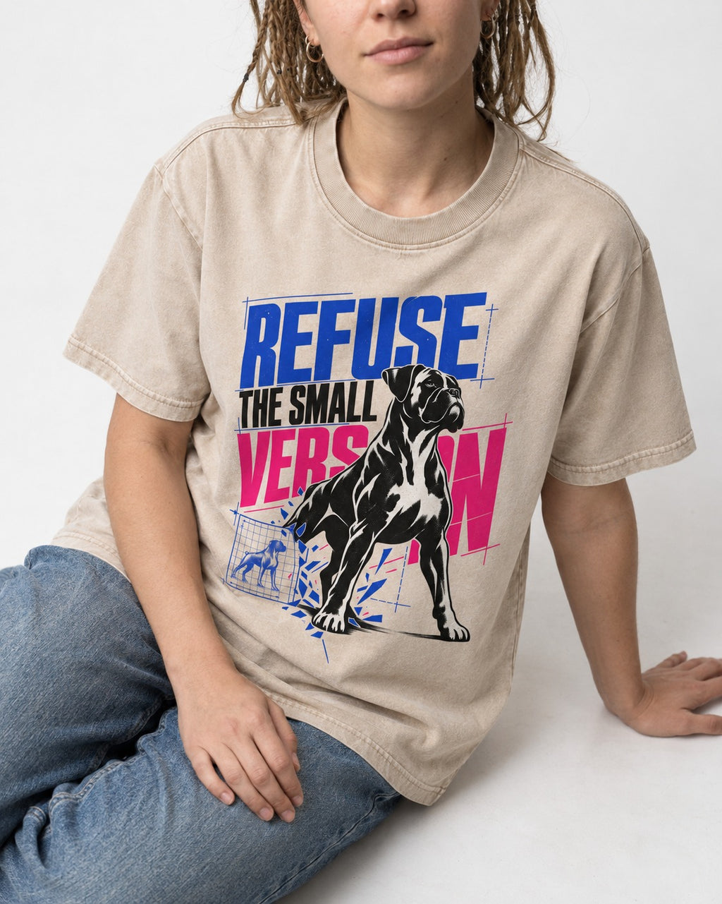 Boxer Refuse the Small Version Washed Tee in Apricot, worn by a seated model