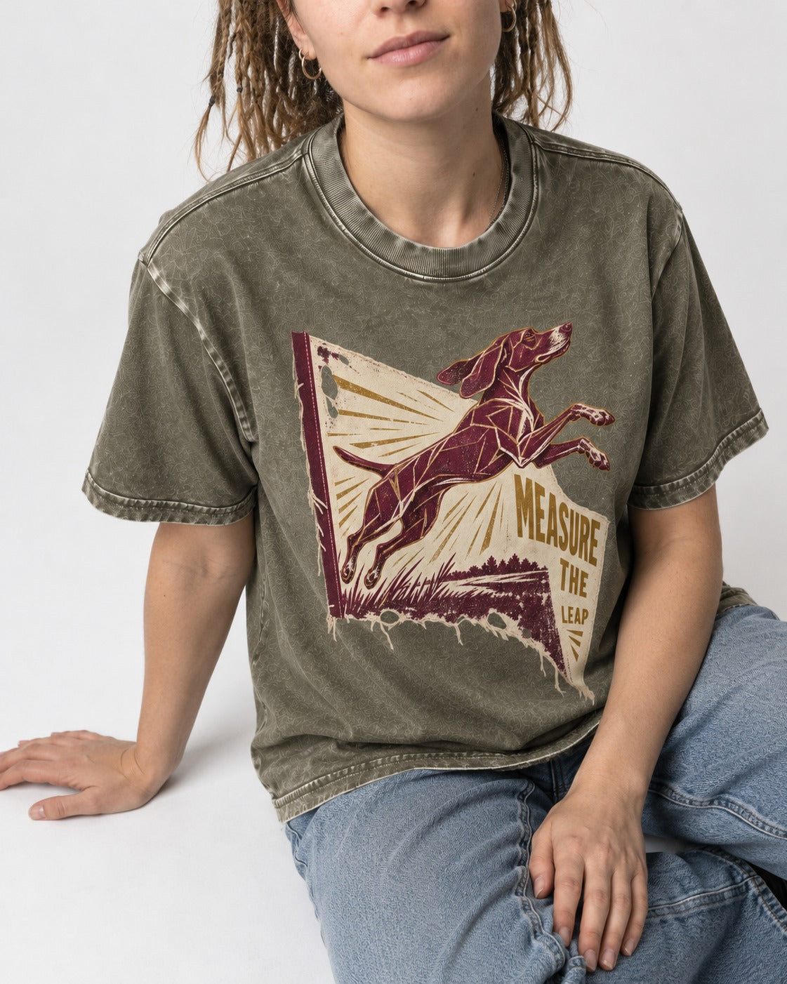 German Shorthaired Pointer Measure the Leap Torn Banner Graphic Washed Tee in Army Green, worn by a seated model