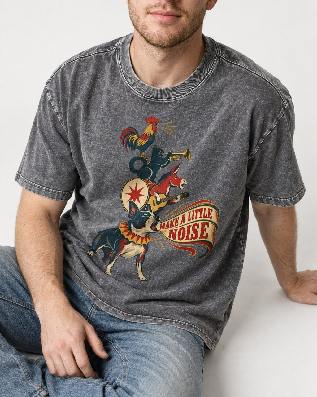 Boston Terrier Make A Little Noise Washed Tee in Gray, worn by a seated model