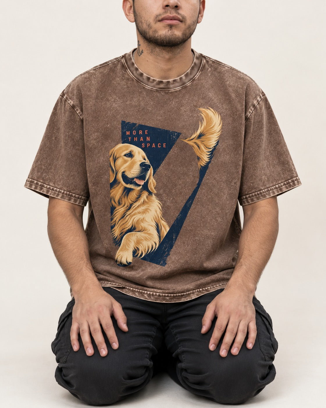 Golden Retriever More Than Space Washed Tee in Coffee, worn by a seated model