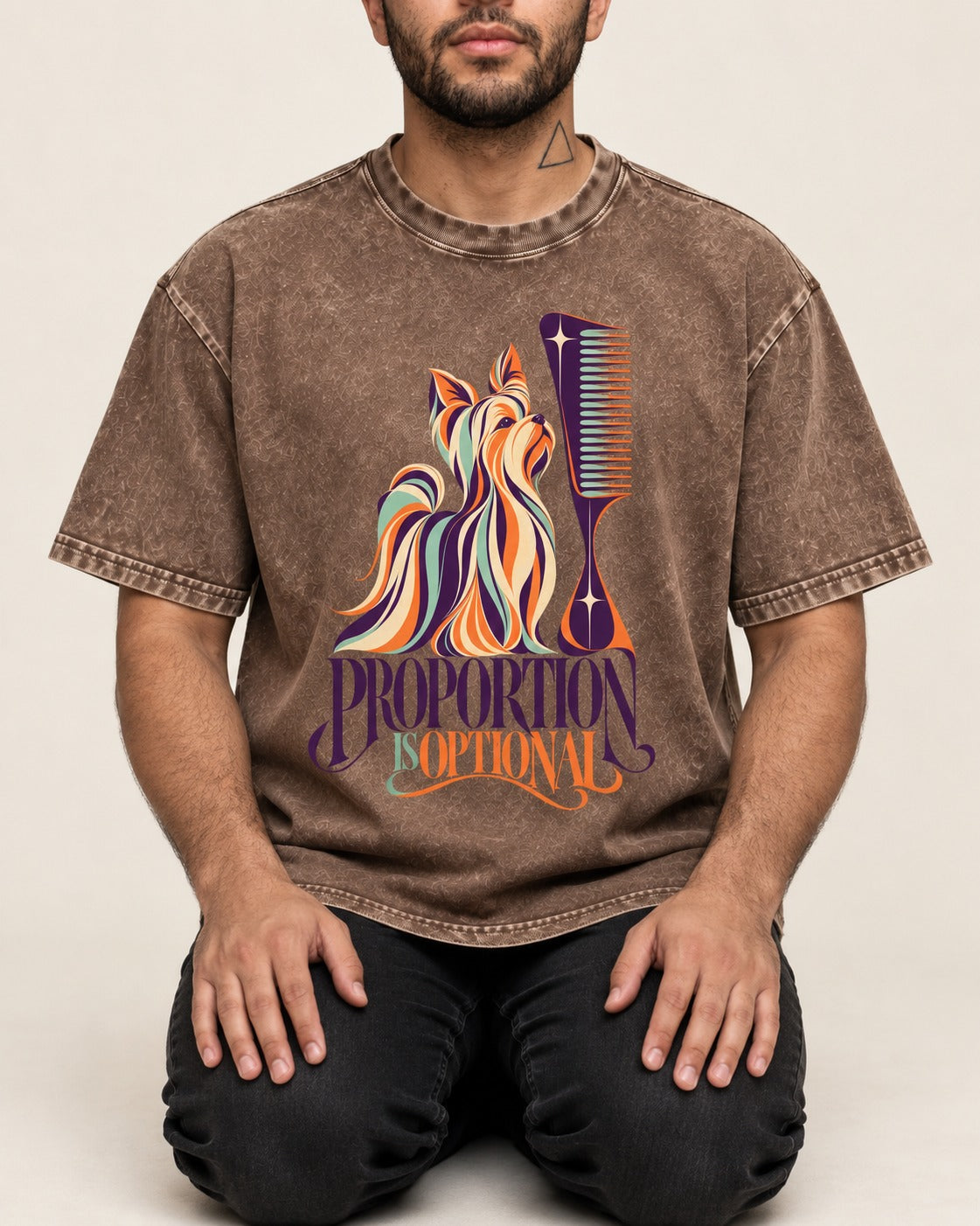 Yorkshire Terrier Proportion Is Optional Washed Tee in Coffee, worn by a seated model