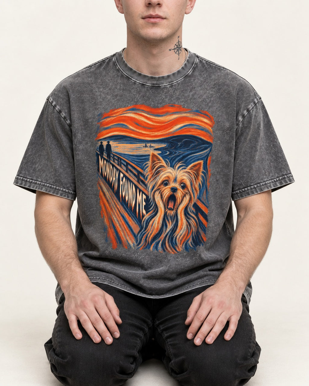 Yorkshire Terrier Monday Found Me Scream Parody Graphic Washed Tee in Gray, worn by a seated model