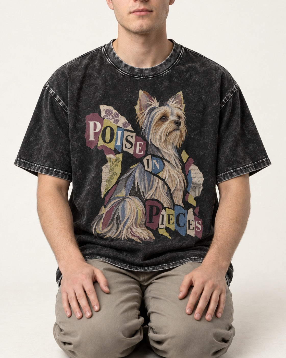 Yorkshire Terrier Poise in Pieces Torn Paper Collage Graphic Washed Tee in Black, worn by a seated model