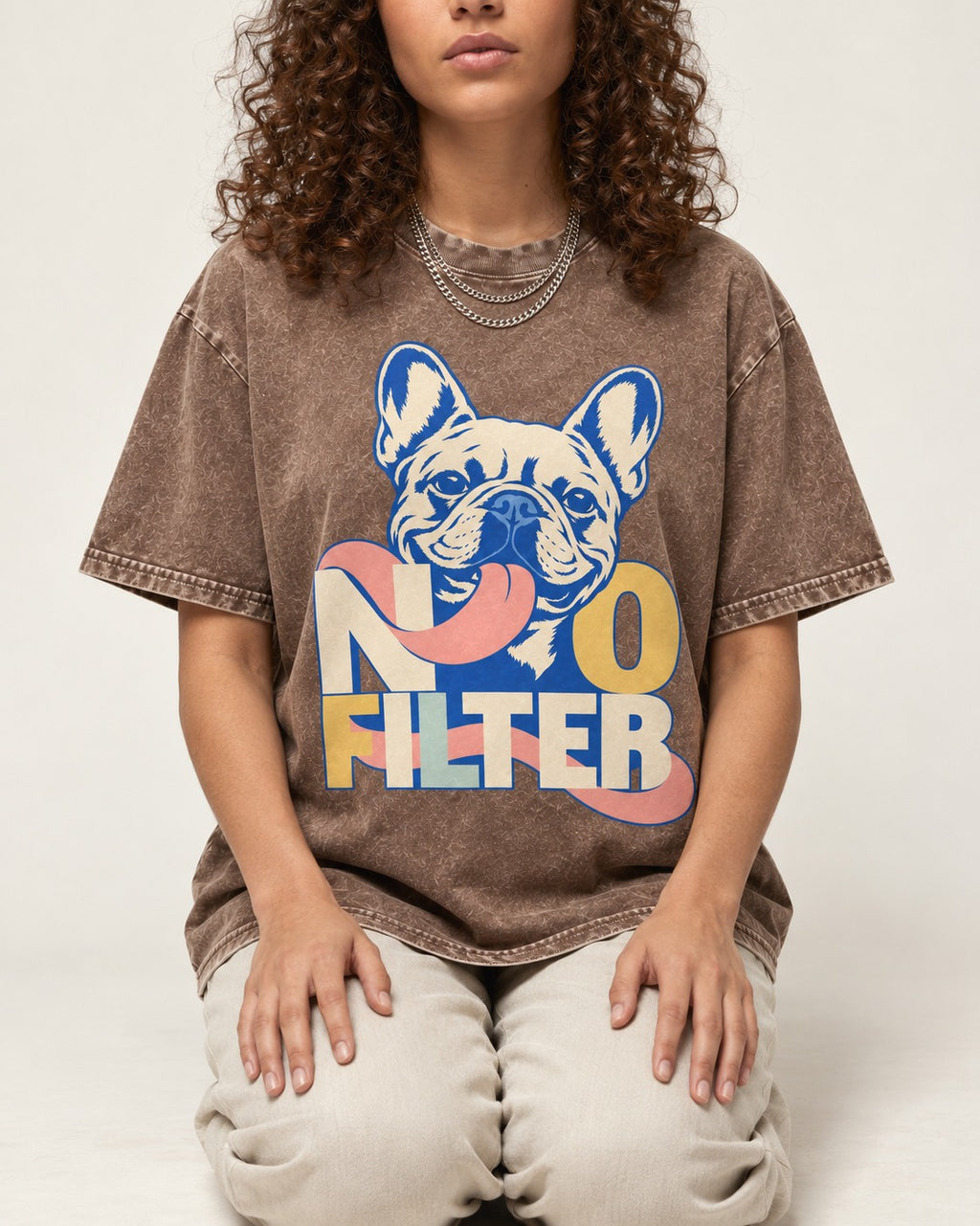 No Filter Frenchie Washed Tee in Coffee, worn by a seated model