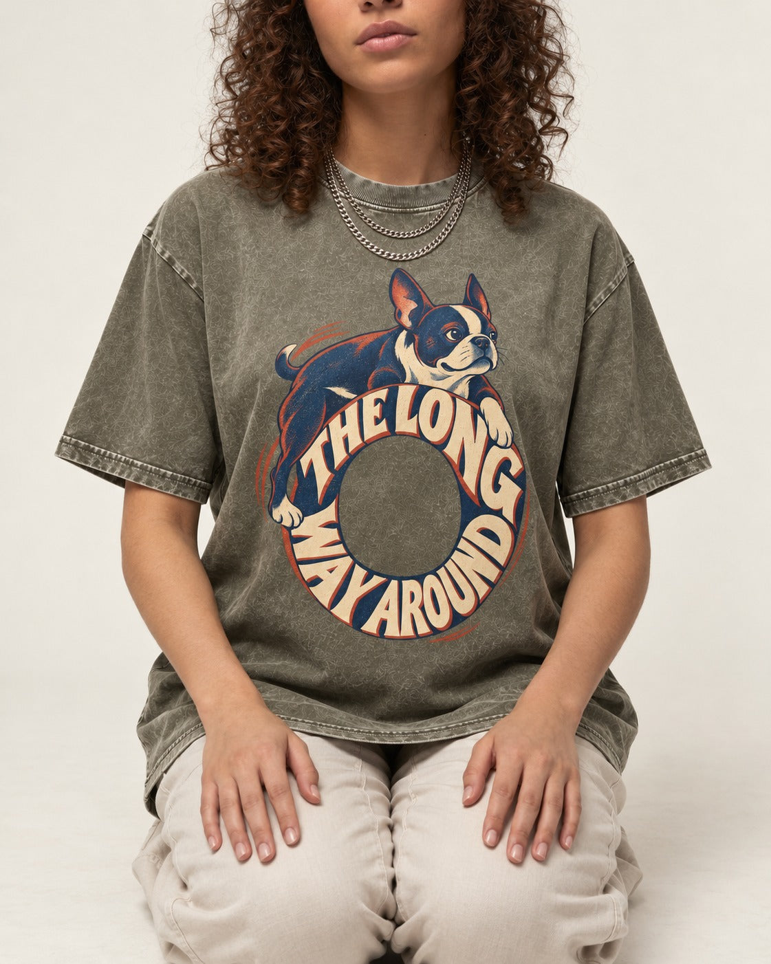 Boston Terrier the Long Way Around Washed Tee in Army Green, worn by a seated model