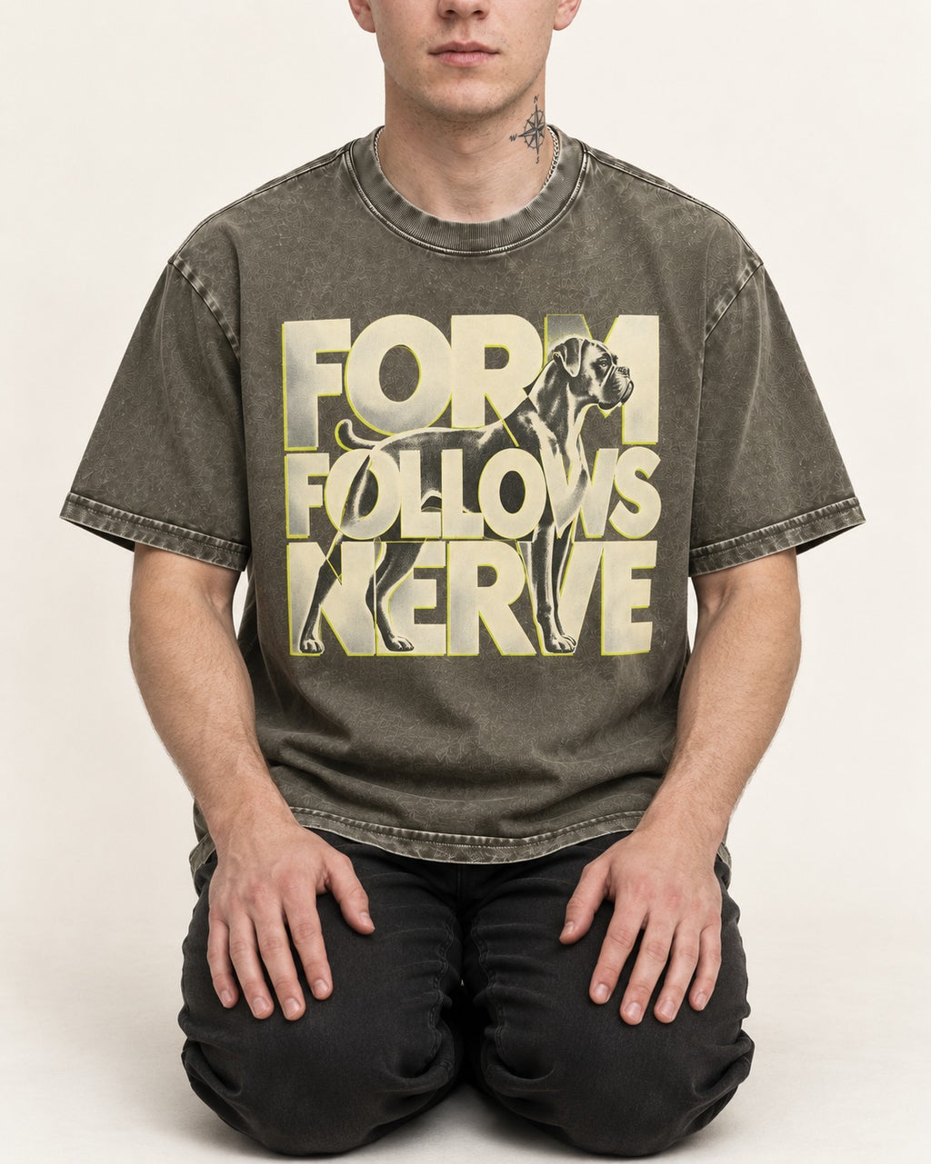 Form Follows Nerve Boxer Typography Washed Tee in Army Green, worn by a seated model