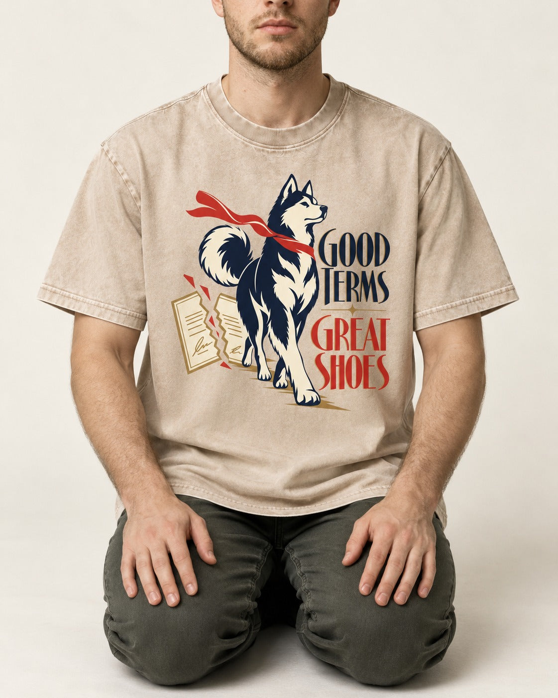 Husky Good Terms Great Shoes Washed Tee in Apricot, worn by a seated model