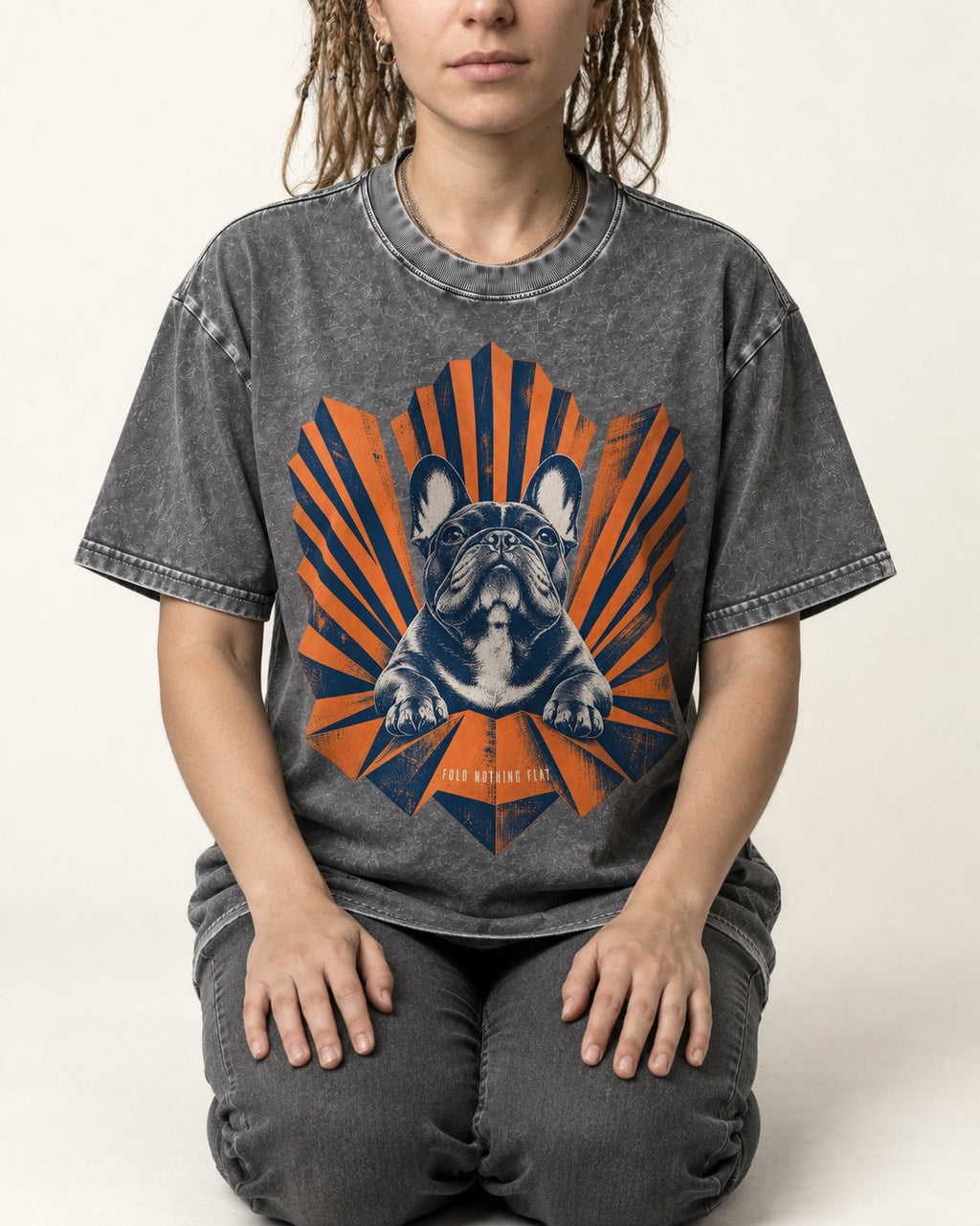 Frenchie Fold Nothing Flat Geometric Fan Graphic Washed Tee in Gray, worn by a seated model