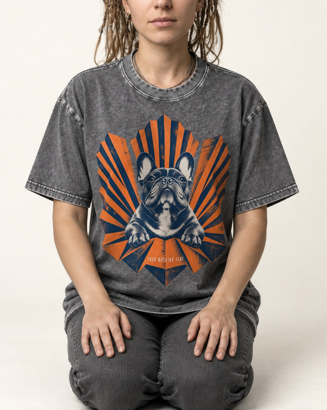 Frenchie Fold Nothing Flat Geometric Fan Graphic Washed Tee in Gray, worn by a seated model