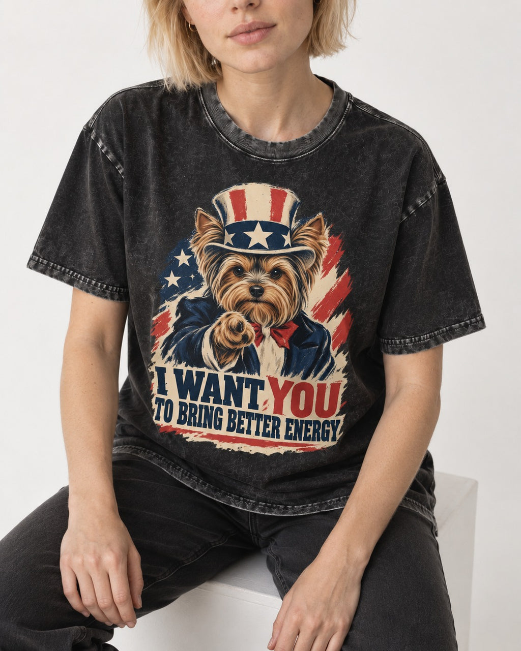 Yorkshire Terrier I Want You to Bring Better Energy Recruitment Poster Graphic Washed Tee in Black, worn by a seated model