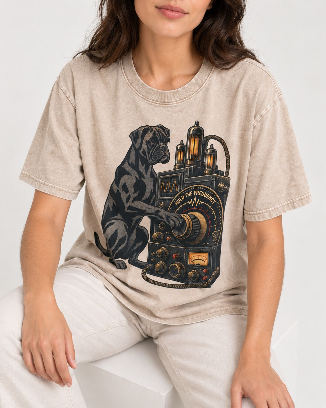 Hold the Boxer Frequency Washed Tee in Apricot, worn by a seated model