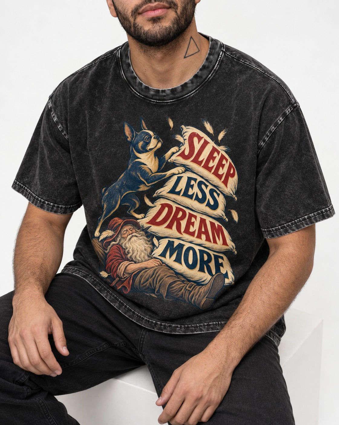 Boston Terrier Sleep Less Dream More Washed Tee in Black, worn by a seated model