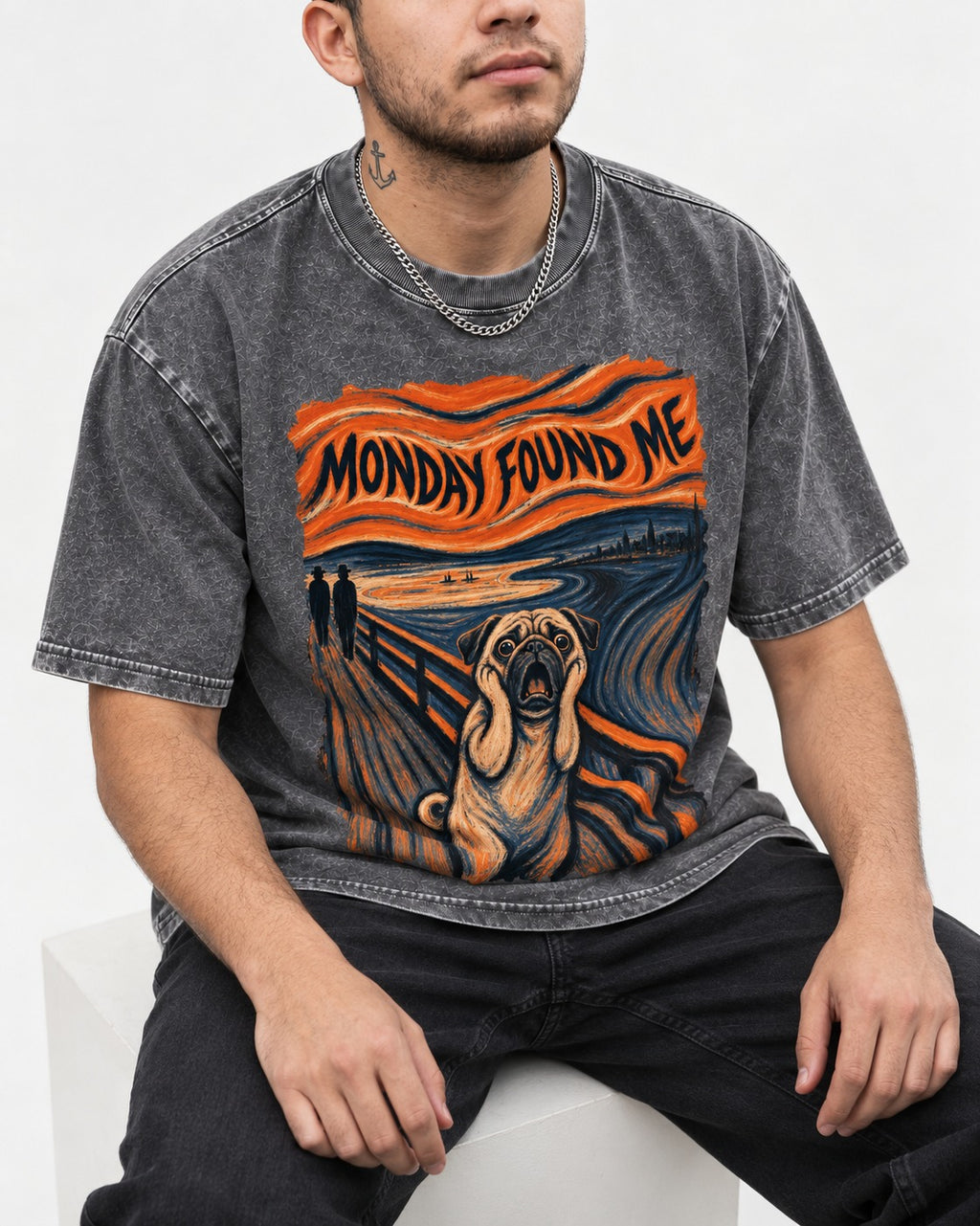 Pug Monday Found Me Scream Parody Graphic Washed Tee in Gray, worn by a seated model