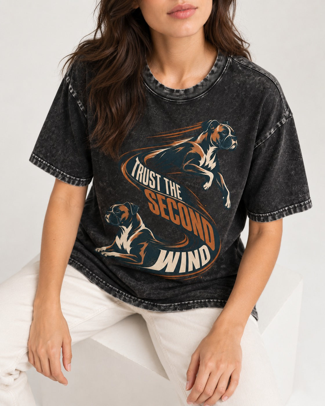 Trust the Second Wind Boxer Motion Graphic Washed Tee in Black, worn by a seated model