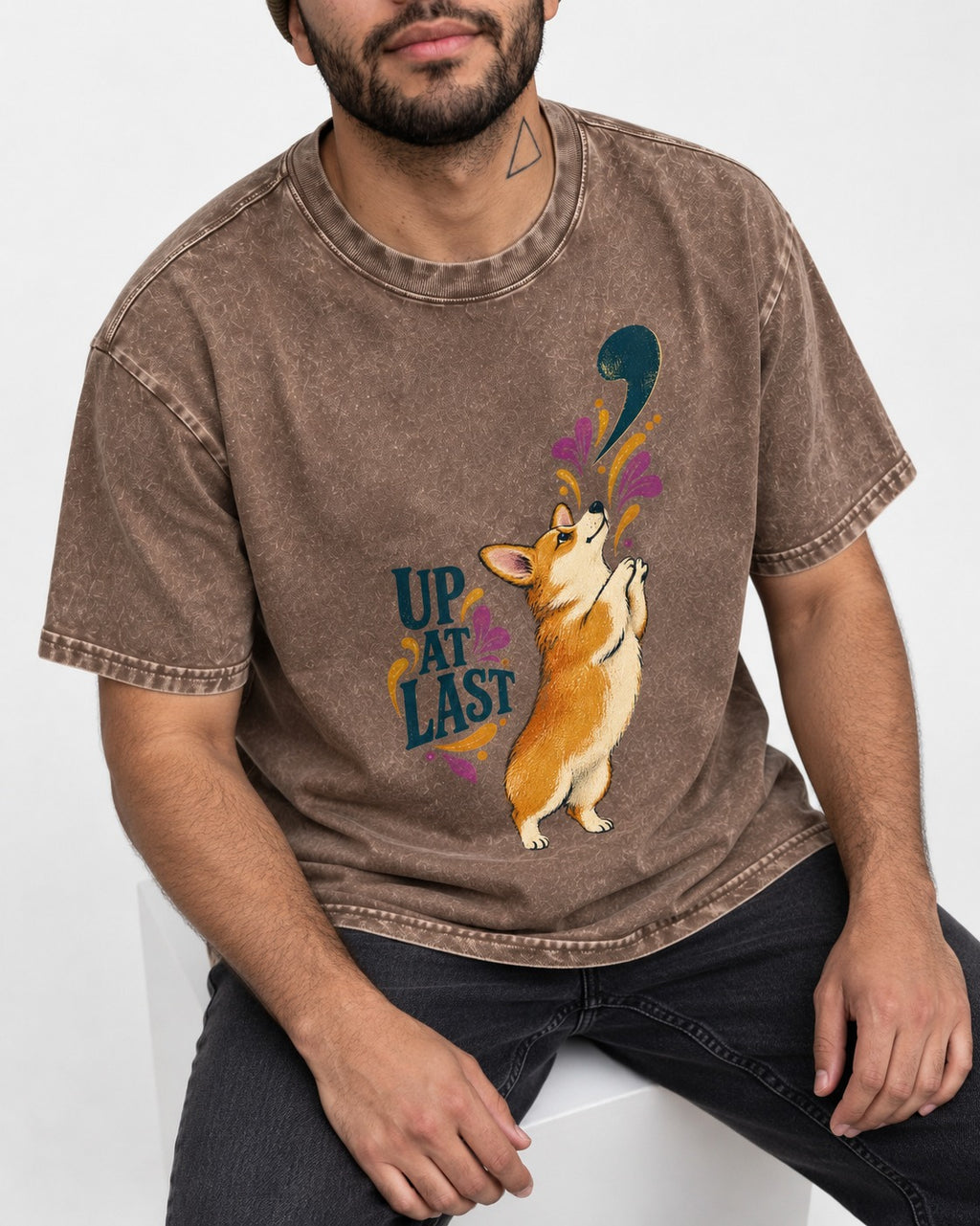 Corgi Up at Last Washed Tee in Coffee, worn by a seated model