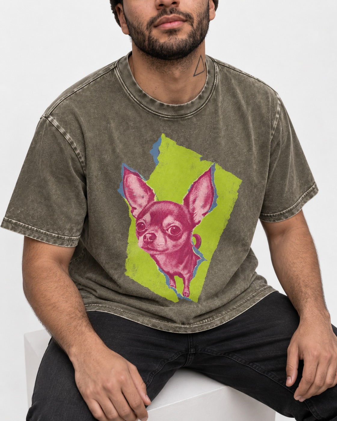 Torn-Paper Chihuahua Portrait Washed Tee in Army Green, worn by a seated model