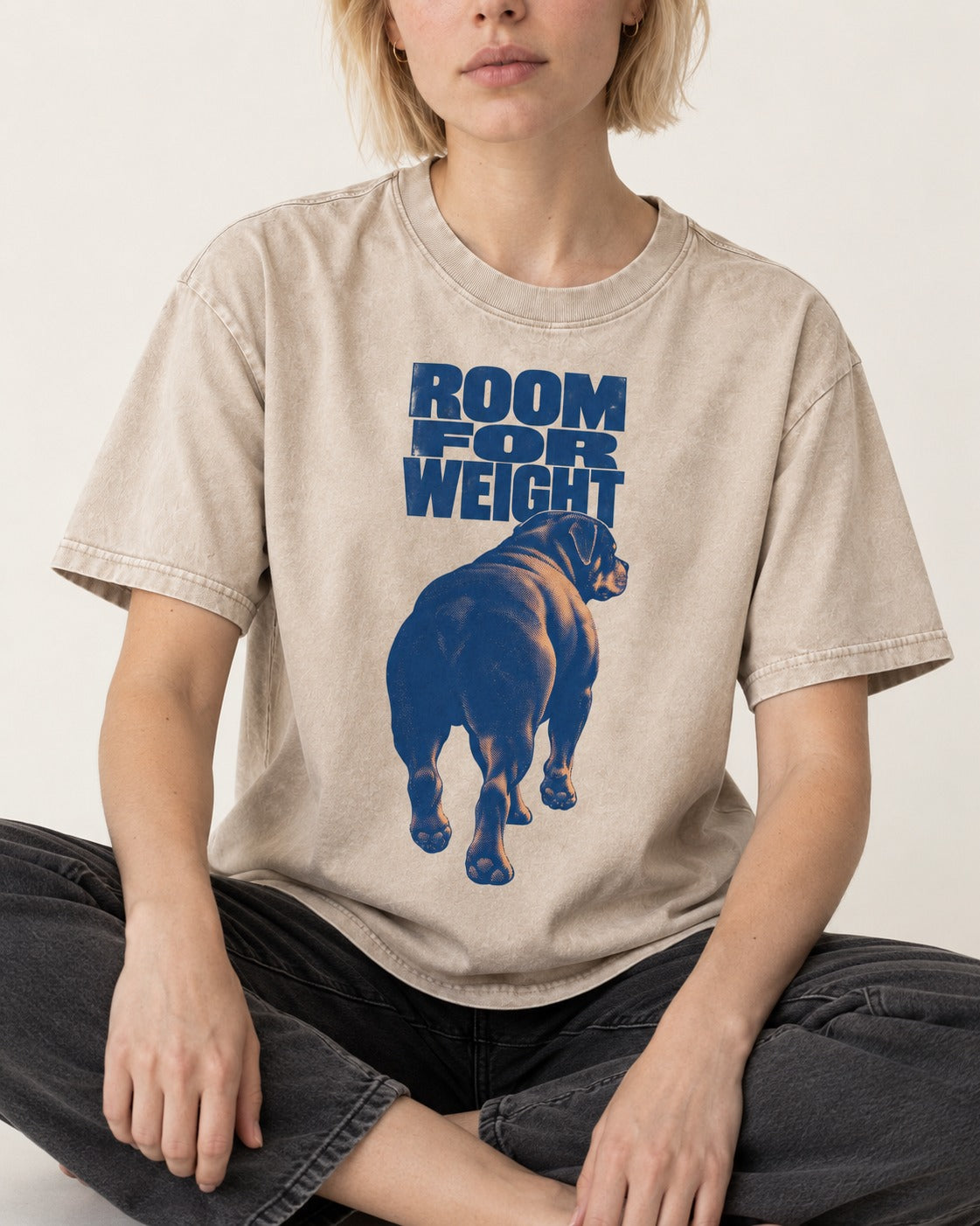 Room for Weight Rottweiler Washed Tee in Apricot, worn by a seated model