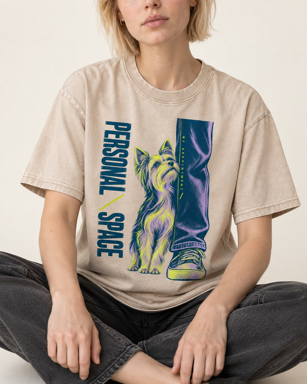 Yorkshire Terrier Personal Space by Appointment Washed Tee in Apricot, worn by a seated model