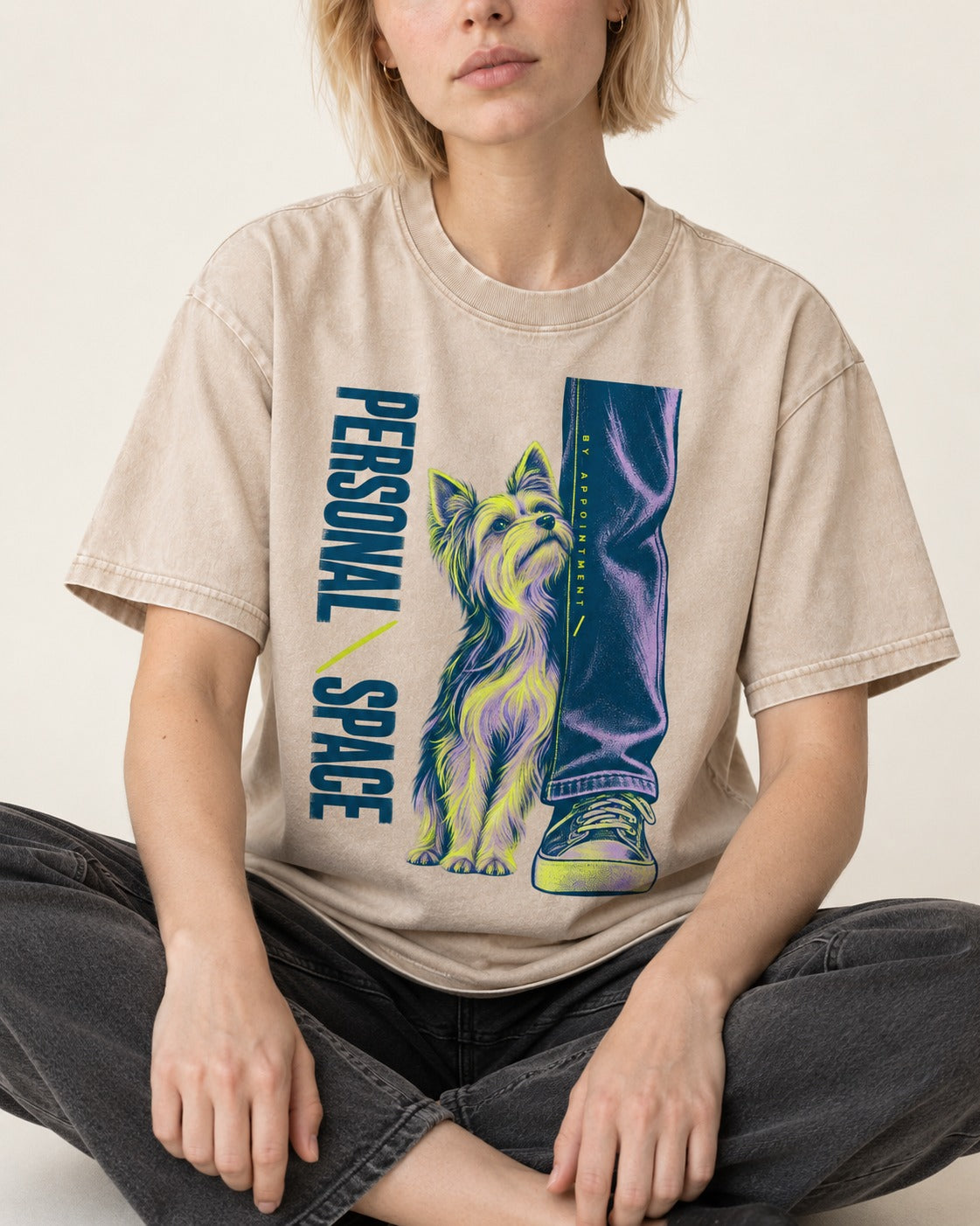 Yorkshire Terrier Personal Space by Appointment Washed Tee in Apricot, worn by a seated model