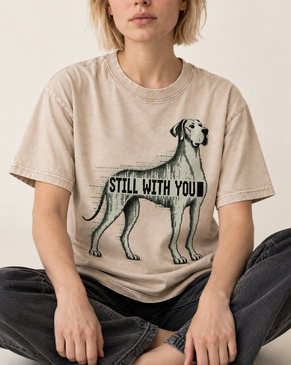 Still with You Great Dane Washed Tee in Apricot, worn by a seated model