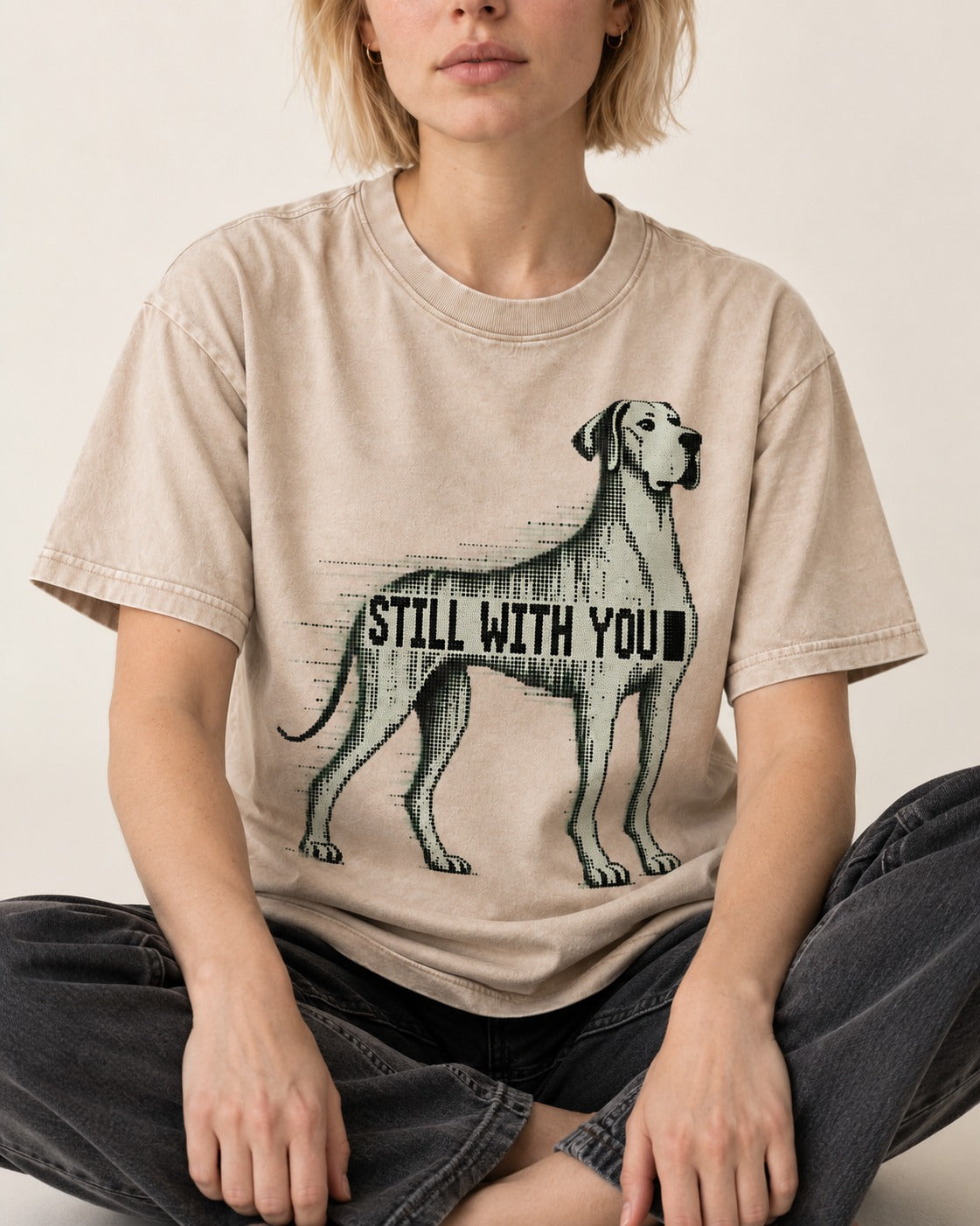 Still with You Great Dane Washed Tee in Apricot, worn by a seated model