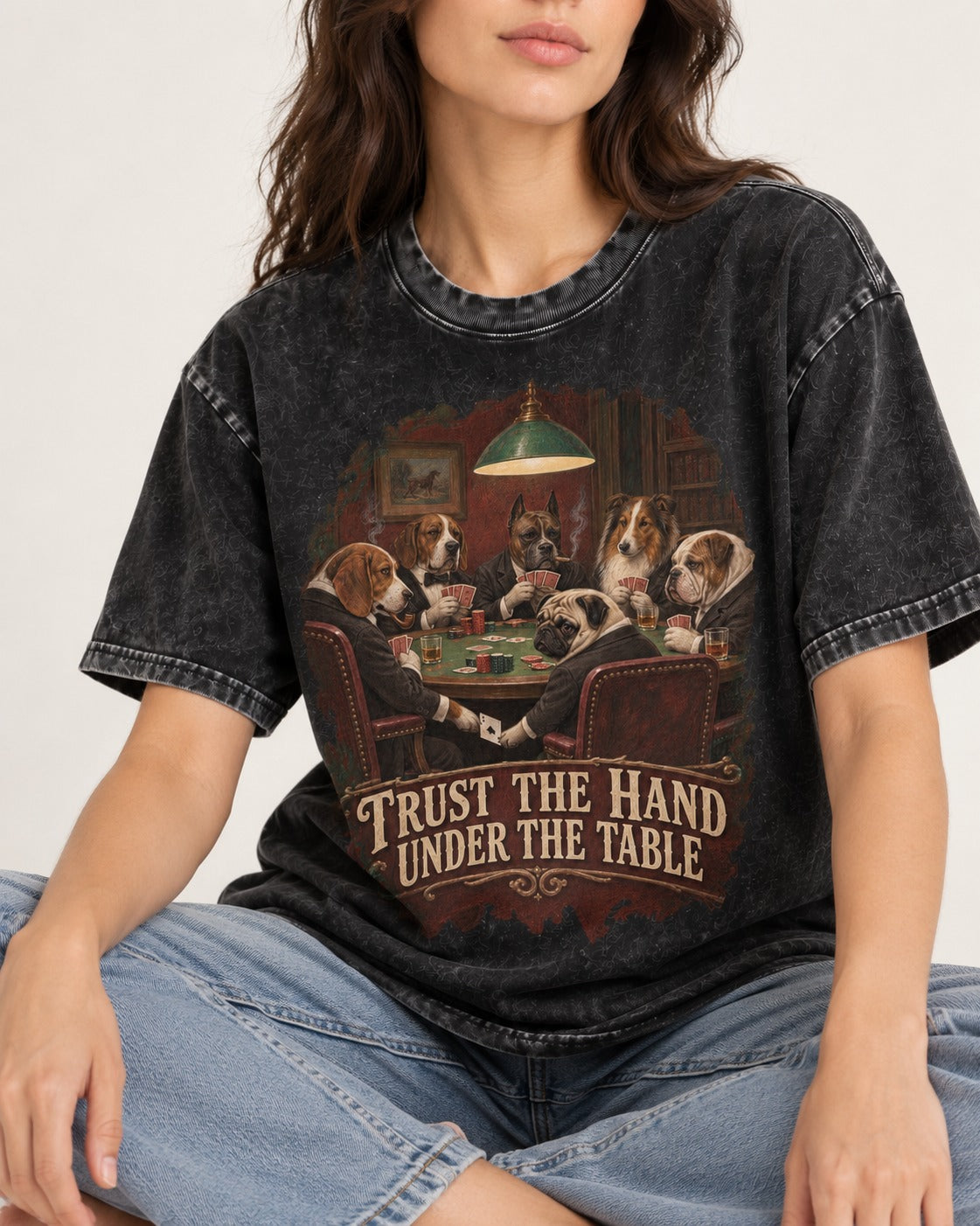 Pug Trust the Hand Under the Table Poker Graphic Washed Tee in Black, worn by a seated model