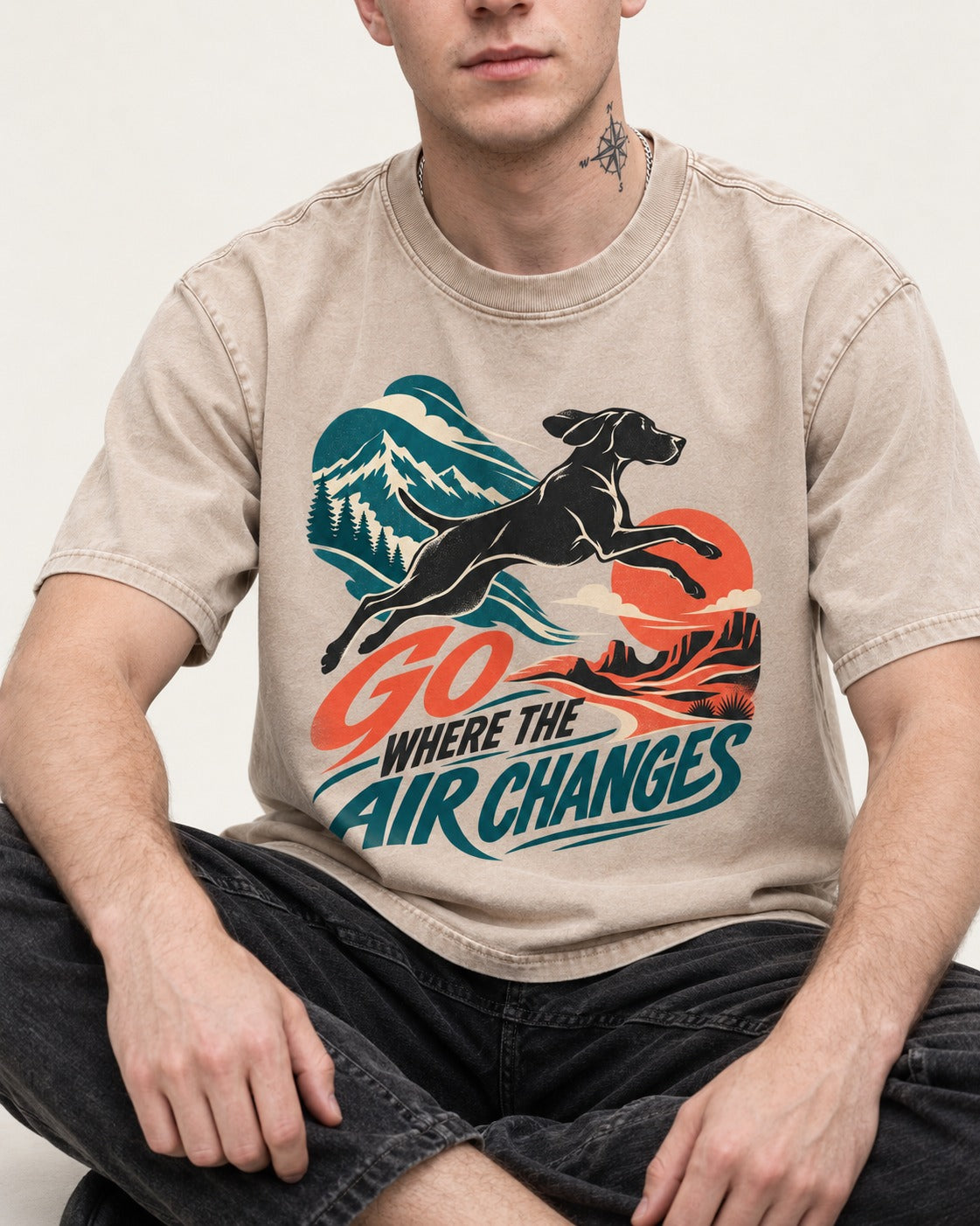 German Shorthaired Pointer Where the Air Changes Washed Tee in Apricot, worn by a seated model