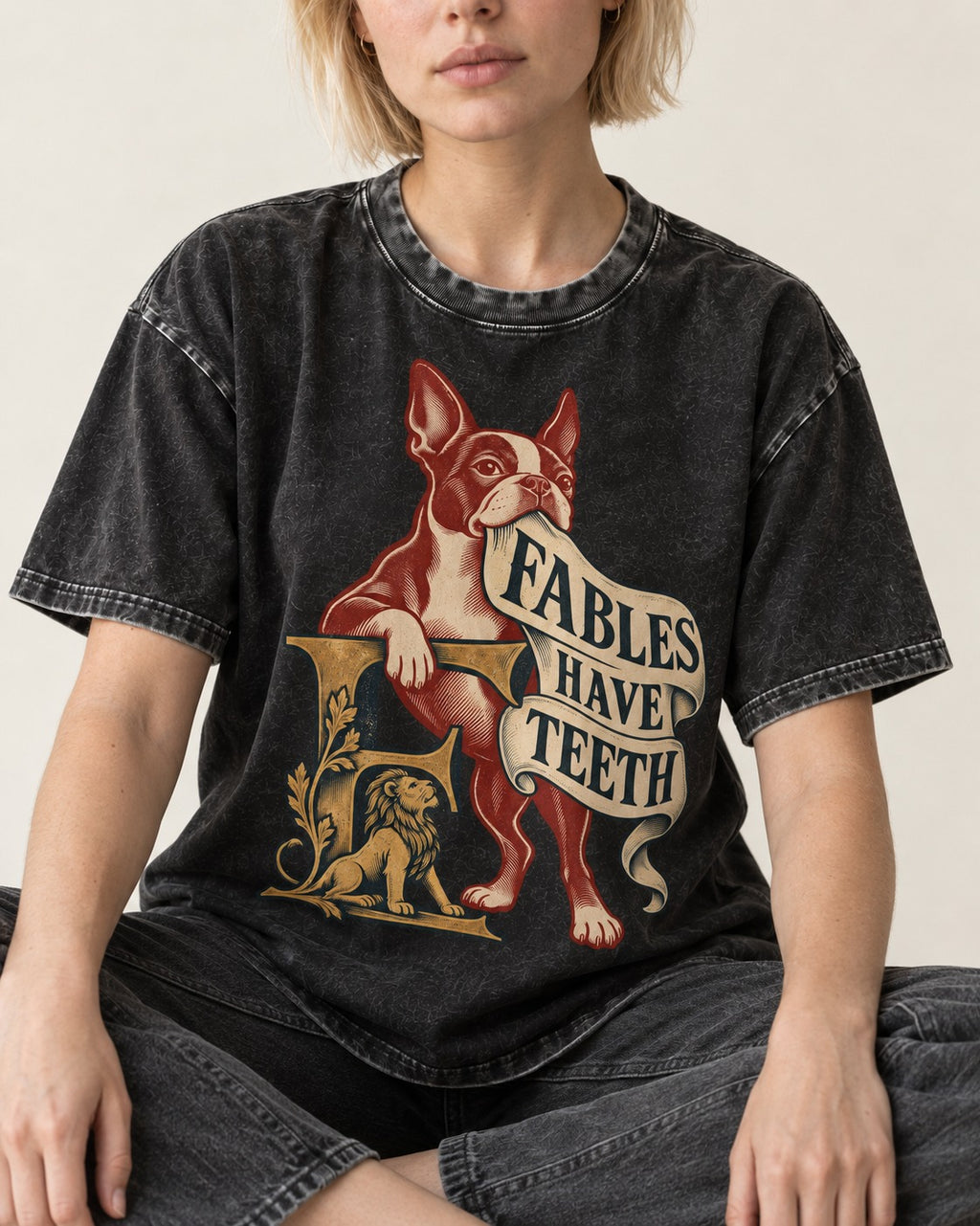 Boston Terrier Fables Have Teeth Washed Tee in Black, worn by a seated model